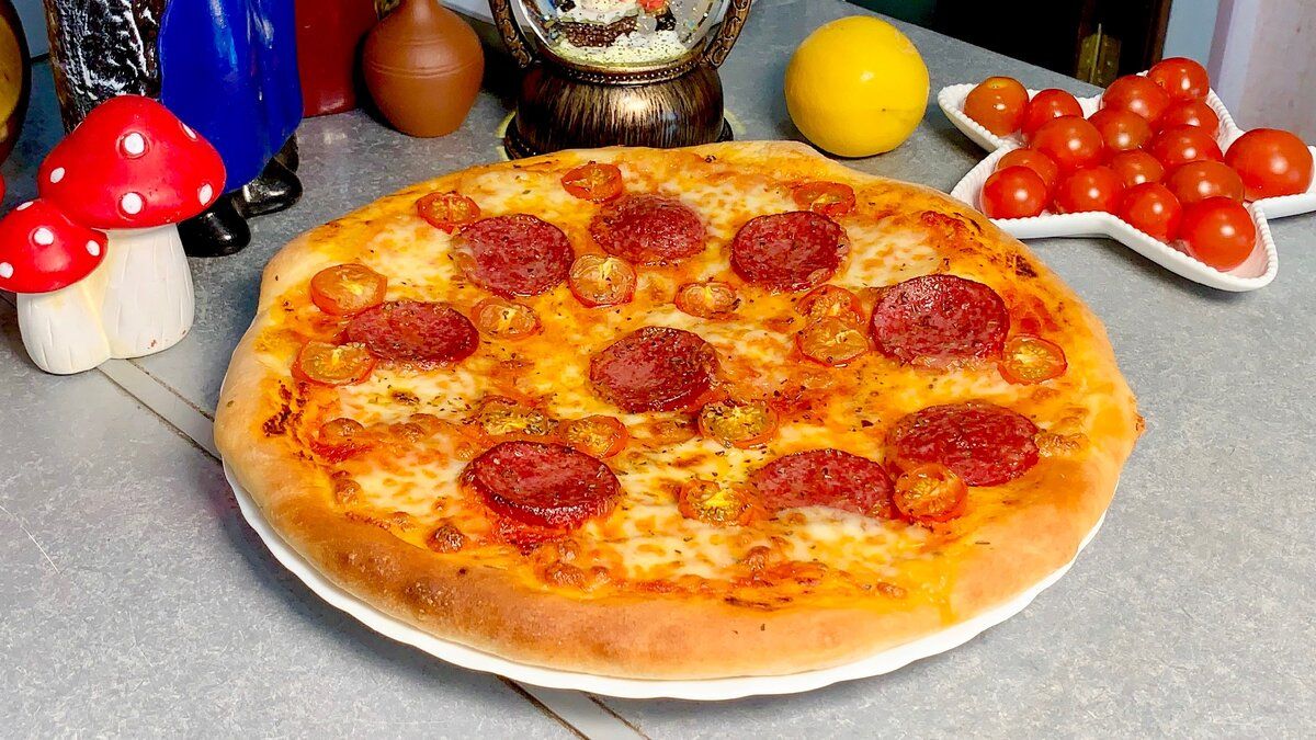 Приготовление идеальной пиццы в домашних условиях